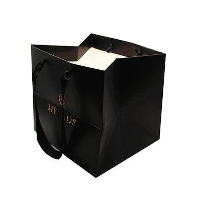 China Recyclable Unique Luxury Decorative Hot Stamping Paper Shopping Bag for sale