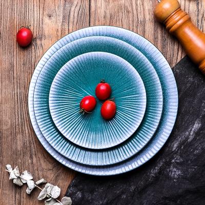 China Sustainable Wholesale Ceramic Durable Porcelain Flat Dark Green Color Three Sizes Round Plate With White Color Decorated Side for sale