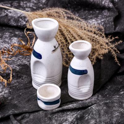 China Sustainable Japanese Restaurant Ceramic Saki Pot And Ceramic Wine Cup Set Without Hand Grip Embedded Design Is Easy To Hold for sale