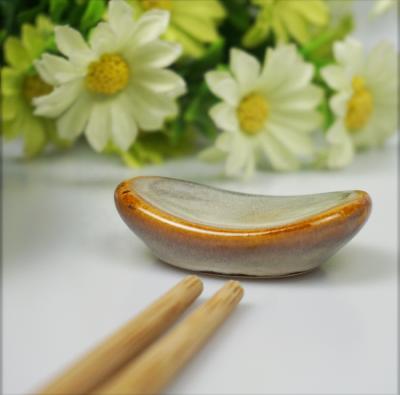 China Viable Unique Reactive Color Luster Ceramic Chopsticks Rest Accessories Ceramic Chopsticks Holder for sale