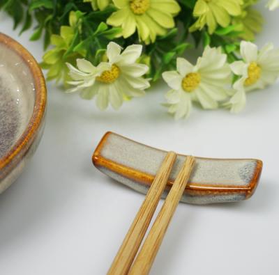 China Sustainable Ceramic Reactive Color Glaze Rectangle Shaped Chopsticks Sit Tableware Accessories for sale