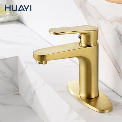 China Huayi Single Hole Modern Brass Basin Mixer Taps Gold Metered Luxury Bathroom Faucet for sale