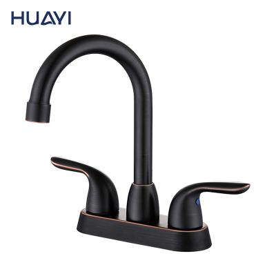 China Faucets Huayi Oil Dosed Rubbed Bronze 4 Inch Centerset Double Handle Taps Basin Sink Faucet Bathroom Mixer for sale