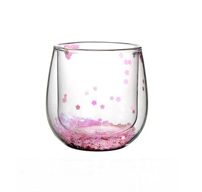 China Custom Double Wall 300ml Glass Wine Glass Cup With Confetti Glitter Romantic Drinking Cup Tumbler for sale