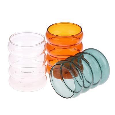 China Fashion Wave Shape Heat Resistant Glass Cup Drinkware Stained Glass Drink Bottle for sale