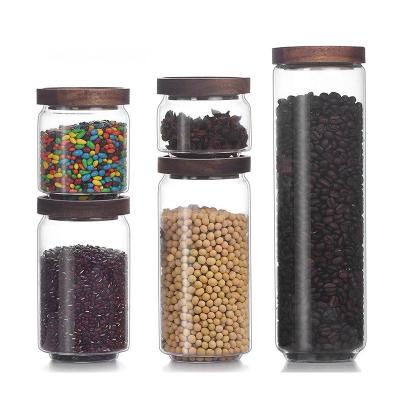 China Transparent Heatable Household Grain And Dried Fruit Glass Storage Jar With Acacia Wood Lid for sale