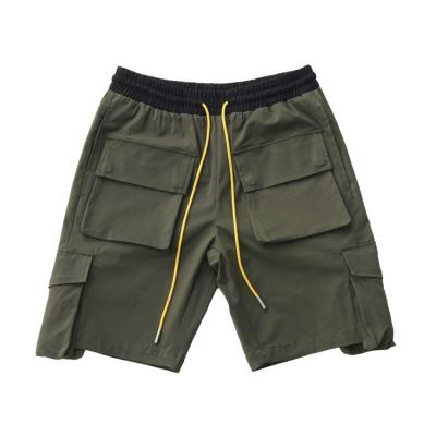 China Green Breathable Micro-elastic Material Irregular Material Army Trend Beauty Multi-pocket Stereo Cargo Shorts for sale