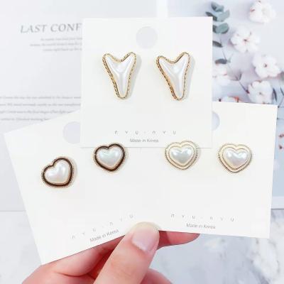 China 2021 trend Korean style fast delivery earrings fashion luxury pearl alloy metal handmade earrings in stock for sale