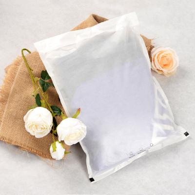 China Bio Degradable Semi Transparent Flint Glazed Paper Ziplock Bag Compostable Clothing Packaging Bag for sale