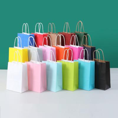 China Twisted Handle Custom Printed Kraft Paper Bags 15*21*8cm 21*27*11cm 26*32*12cm for sale