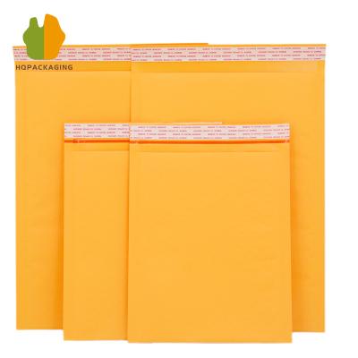 China Bolsas de bolsas de papel kraft amarillo 155g Coextrusión de bolsas de protección a prueba de golpes Seguridad del transporte en venta