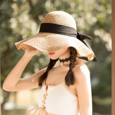 China Foldable Soft Wide Bowknot Straw Hats Women Wholesale Brim Sunscreen Summer Beach Outdoor Sun Hat Large Image for sale