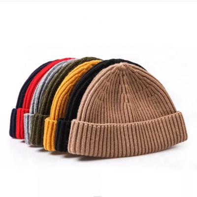 China OEM Warm Custom JOINT Acrylic Solid Multi Color Knitted Winter Beanie Hats Unisex for sale