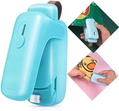 China Handheld Portable Mini Quick Sealer Machine Household Food Packing Bag Hand Press Slide Lid Sealer for Kitchen Supplies for sale