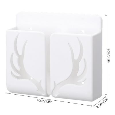 China New Arrival Model PORTABLE Antlers Mini Charging Holder Rack Hollow Organizer Box Wall Mount Phone Holder Self-Adhesive for sale