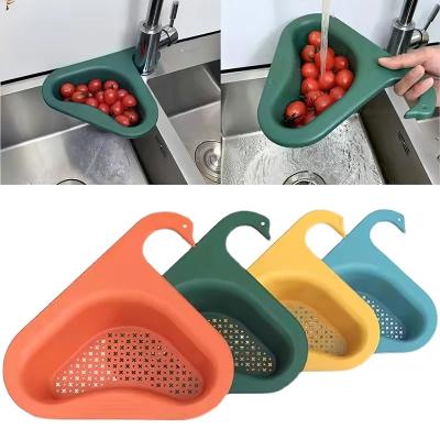 China Multifunctional Viable Hanging Organizer Plastic Swan Sink Storage Rack Faucet Sponge Holder Drain Basket For Kitchen for sale