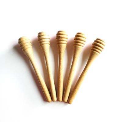 China Customized Spike Wooden Honey Plunger Sticks Wooden Honey Stirrer for sale