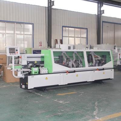 China Machinery Repair Shops DM506K Edging Machine With Slotting Unit PVC Edge Bander for sale