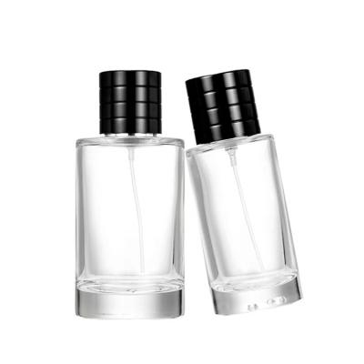 China 50ml 100ml Perfume Bottle Cosmetic Empty Cylinder Shape Glass Clear Cosmetic Bottle for sale