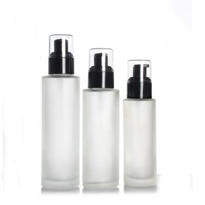 China Cosmetic Matte White Color 10ml 20ml 30ml 50ml 100ml Clear Glass Frosted Round Cosmetic Lotion Bottle Press Pump Bottle for sale