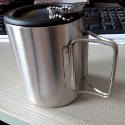 China Mountaineering Travel Stainless Steel Cups Folding Handle Camping Mugs Te koop