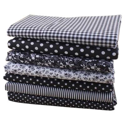 China DIY 50*50cm 7pcs /bag viable figure printing cotton soft canvas black white colors patchwork fabric for sale