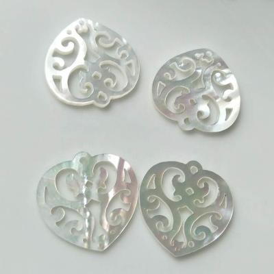 China FASHIONABLE Natural Pearly Shell Hollow Carved Flower Heart Shaped Charm Pendant Jewelry for sale