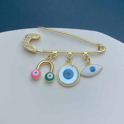 China Luxury Classic ALLOY BROOM Shell Evil Eye Brooches Pin Women Jewelry Accessories For Gift Wholesale for sale