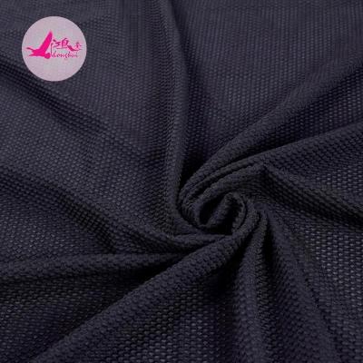 China Plain Semi-Dull Stretch Mesh Fabric 75 Spandex 25 Nylon Sportswear Fabric for sale