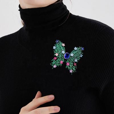 China Trendy Jewelry South Korea Fashion Jewelry New Colored Zircon Flowers Butterfly Brooches Women for sale