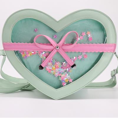 China New Fashion PU Leather Heart Shape Ita Bag Clear Window Ita Cross - Body Bag With Bow Tie Decoration for sale