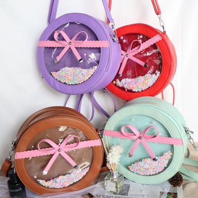 China AIE Multifunctional Bag Custom Design Round Ita Bag Cute Clear Window Shoulder Bag Bow Tie Pin Bag Display for sale