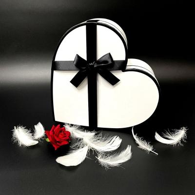 China Recycled Materials Wholesale Reusable Luxury Black White Rose Heart Shape Gift Flower Cardboard Mothers Day Flower Box For Wedding Party for sale