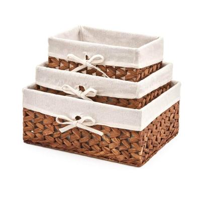 China Sustainable Set of 3 PE Woven Hyacinth Storage Baskets Organizer Container Water Bins with Fabric Canvas Lining for sale