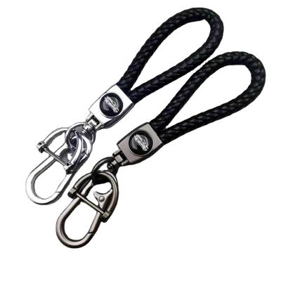 China Leather Creative Dynamic rope logo keychain for sale