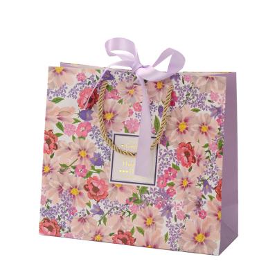 China Handmade Luxury Custom Paper Party Gift Bag Custom Printing Wholesale Customize for sale