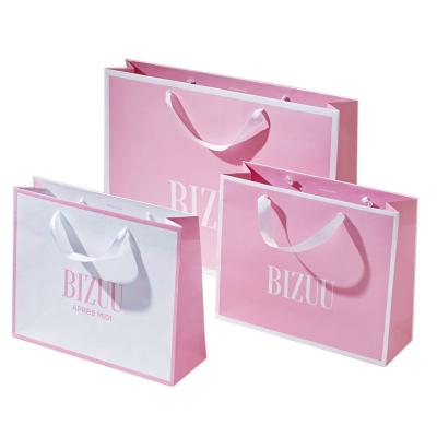 China Handmade Paper Bag Custom Small Pink Shopping Bags With Handles for sale