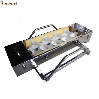 China Horizontal Bee brush beekeeping equipment Electric Bee Brush Auto for sale