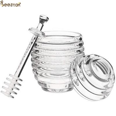 China Two Types Transparent Bee Honey Pot and Spoon With Stirring Rod Crystal Mini Honey Jar for sale