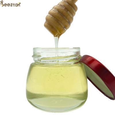 China Miel de abeja 100% natural Miel de acacia blanco puro Miel crudo en venta