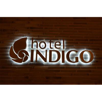 China 3d Buildings Led Backlit Indigo Signs With Mirror Polished Bronze Letter Shell For Hotel for sale