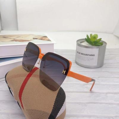 China Zhejiang Wholesale Shading Orange Rimless Sunglasses Women Designer Sunglasses Famous Brands 2021 for sale