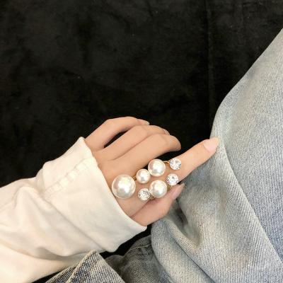 China TRENDY Exaggerated Oversized Irregular Shiny Crystal Retro Rhinestone Pearl Big Rings For Women Wedding Jewelry for sale