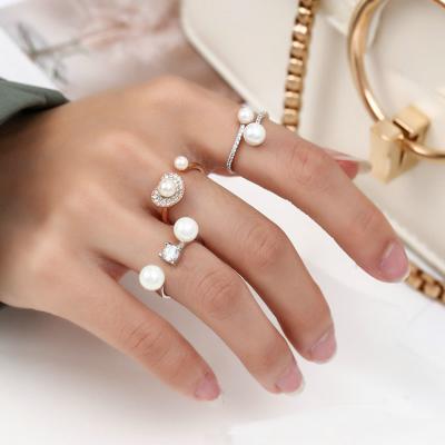 China FASHIONABLE Wholesale 18k Gold Plated Free Size Imitation Pearl Heart Ring For Women for sale