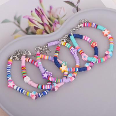 China Personality FASHIONABLE Bohemian Rainbow Soft Pottery Beaded Star Heart Flower Bracelet For Women for sale