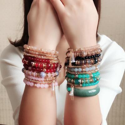 China FASHIONABLE Bohemian Style 4 Layered Elastic Crystal Beads Charm Bracelet Set For Women for sale