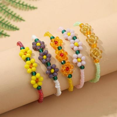 China Resin FASHIONABLE Bohemian Handmade Crystal Beads Woven Flower Bracelet For Women for sale