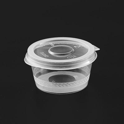 China Microwavable Sauce Cups 1 Ounce Plastic Bottle Cups With Lids for sale