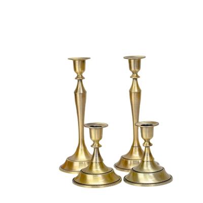 China Retro Plated European Style Metal Candle Holder Candelabra Wedding Prop Candle Dinner Hotel Home Decor for sale