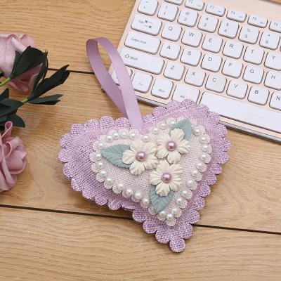 China Deodorization polished souvenir bead gift/flower and lanyard can carry a small sachet for sale